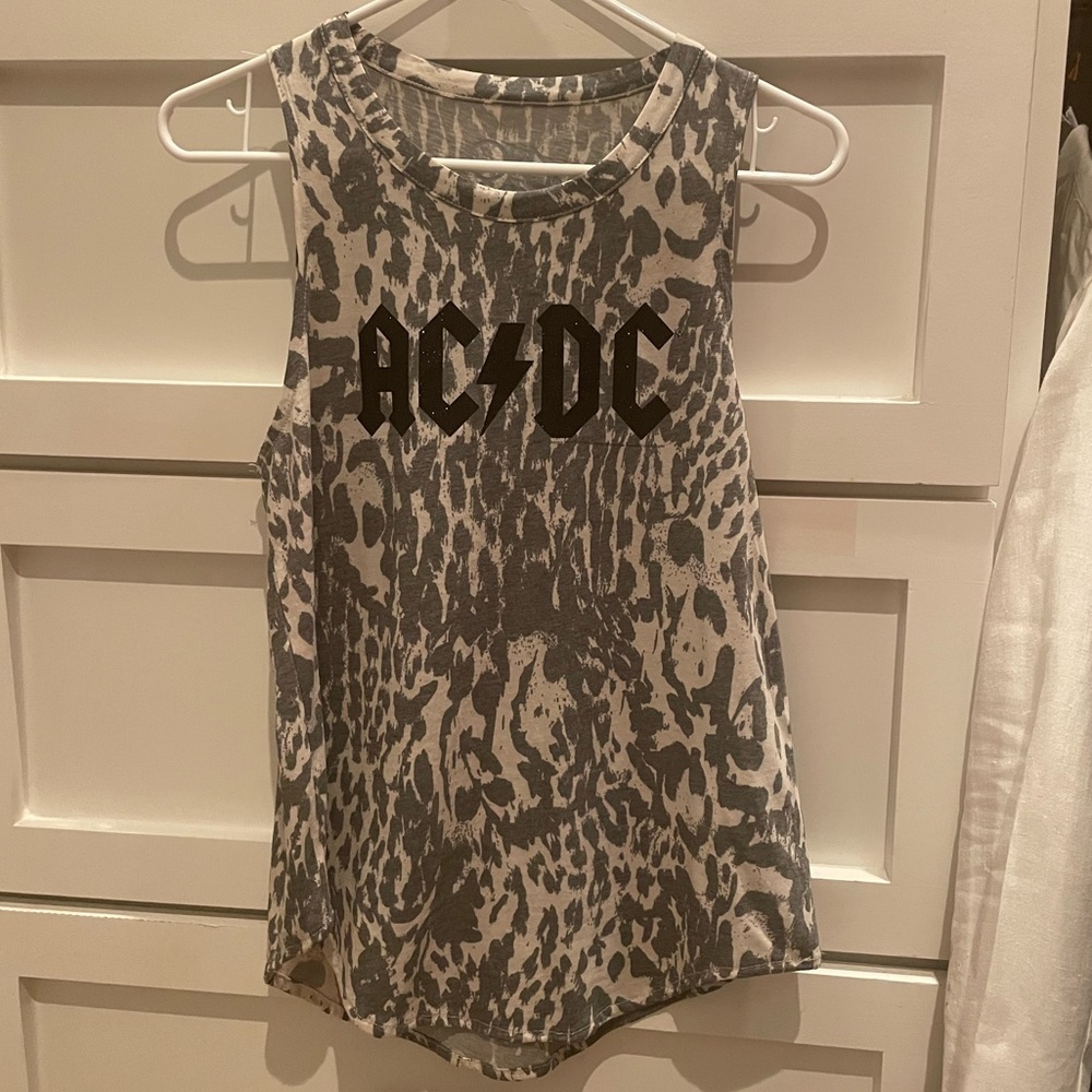 Very cute, soft, never worn sleeveless top.